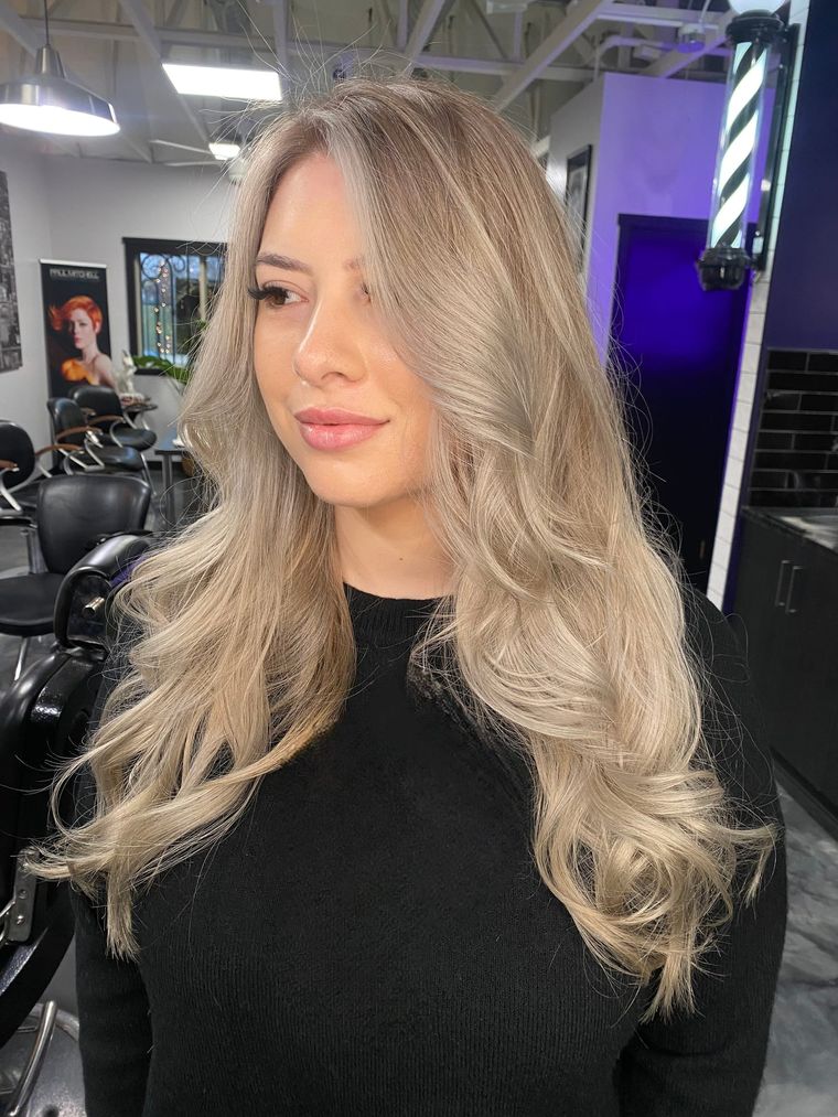 Beige blonde with face-framing layers
