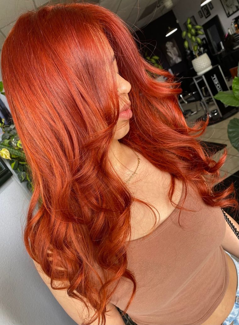 Vivid copper red, long loose waves