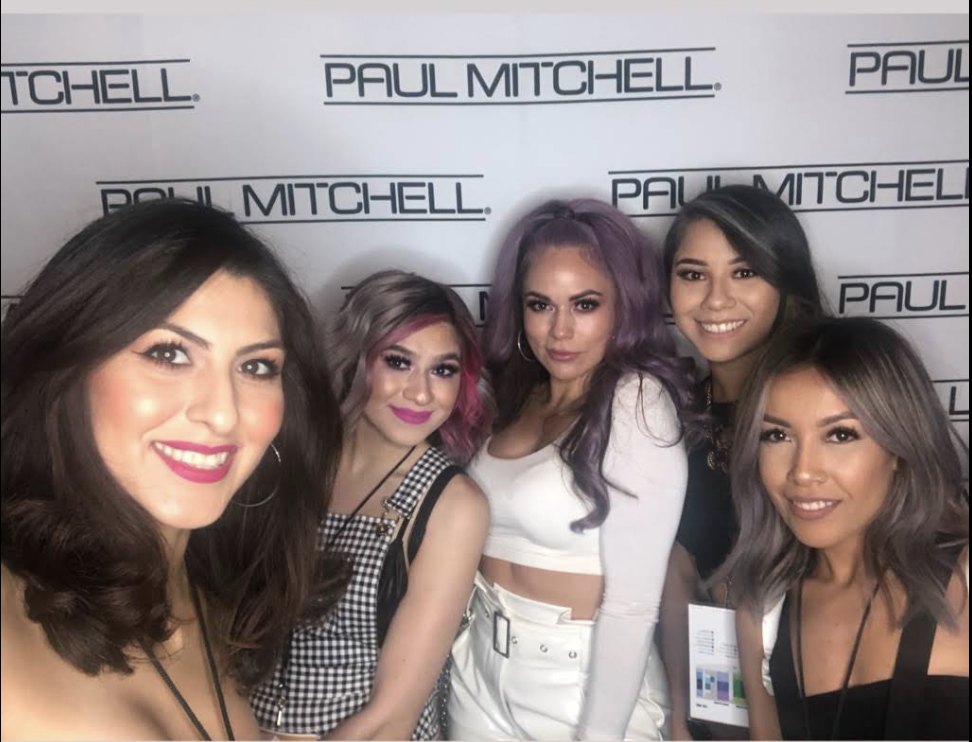 The Revolver Hair Studio team together at a Paul Mitchell industry event